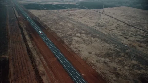 Smooth video from the copter, freeway steppe road fields in the distance forest Vidéo 201293652