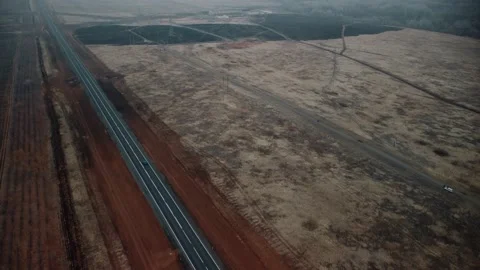 Smooth video from the copter, freeway steppe road fields in the distance forest Vidéo 204879372