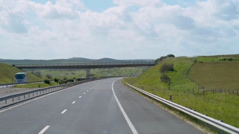 Smooth view from passanger seat driving on highway Stock Footage 273675424