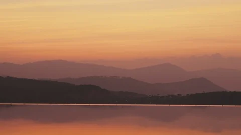 Smooth water surface in infinity pool and misty haze in sky over beautiful hills Stock-Footage 87822427