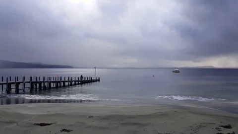 Smooth waves on the beach at Adventure bay Bruny Island Tasmania Stock Footage 81802000