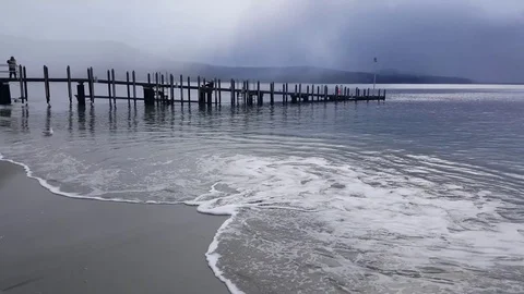 Smooth waves on the beach at Adventure bay Bruny Island Tasmania Stock Footage 81802001