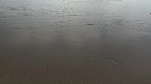 Smooth waves on a calm beach Stock Footage 287825216