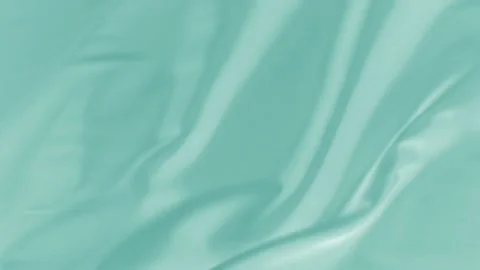 Smooth waves of turquoise cloth rippling in the wind. Background Fabric is tu Stock Footage 169529445