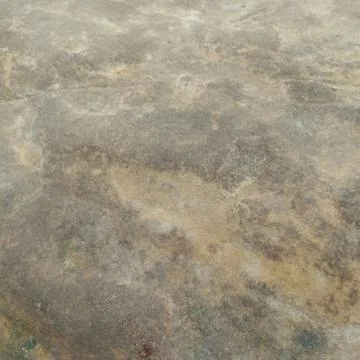 Smooth weathered stone surface texture showing natural color variation 写真素材