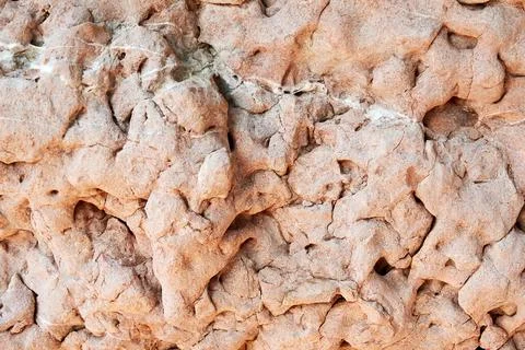 Smooth weathered stone texture with edges and holes Stock Photos