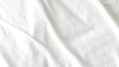 Smooth white bedsheet background, soft texture, clean and minimalist style. Stock Photos