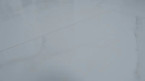 Smooth white marble surface with subtle gray veining ideal for elegant interior Video stock 308871730