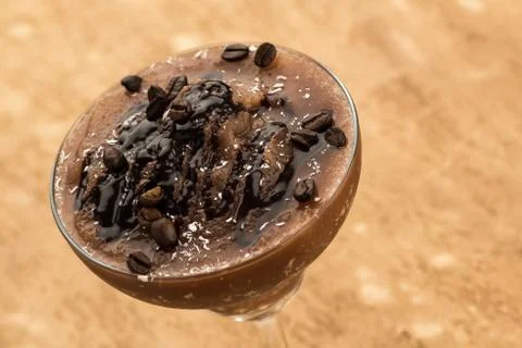Smoothie on a brown background Stock Photos
