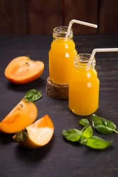Smoothie from persimmon Stock Photos