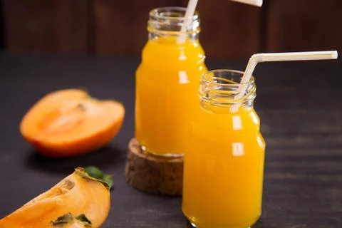 Smoothie from persimmon Stock Photos
