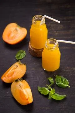 Smoothie from persimmon Stock Photos