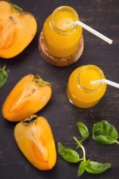 Smoothie from persimmon Stock Photos