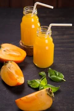 Smoothie from persimmon Stock Photos