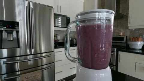 Smoothie preparation Stock Footage 148884238