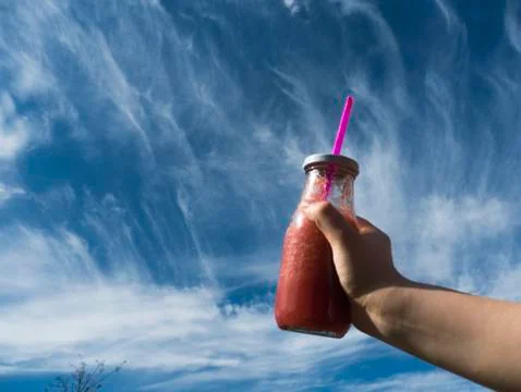 Smoothie with sky background Stock Photos