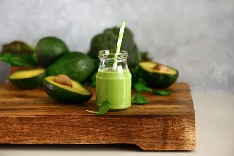 Smoothies in a small glass bottle, front view Stock Photos