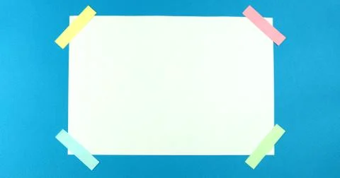 Smoothing a blank sheet on a colored background Stock Photos
