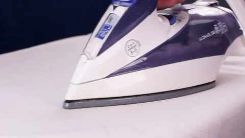 Smoothing-iron using Stock Footage 124949430