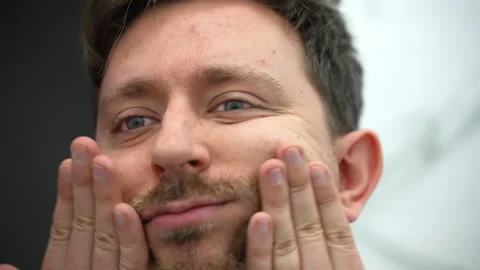 Smoothing procedures after face shaving, sensitive skin, dry shaving concept Stock Footage 221849772