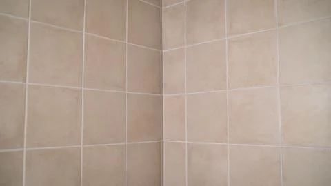 Smoothly gliding camera movement over elegant beige tile surface Stock Photos