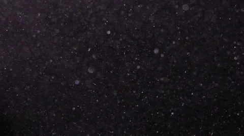Smoothly movement of millions of dust particles set in motion by a strong draft Stock Footage 64076319