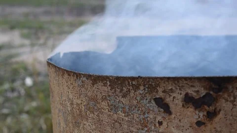 Smouldering smoke in the wind Stock Footage 76377480