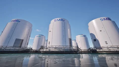 Smr or small modular nuclear reactors power plant against blue sky Stock Footage 335194685