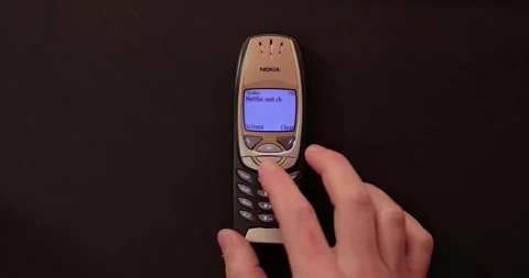Sms message received reading Netfilx and chill on Nokia 6310i Stock Footage 241873839