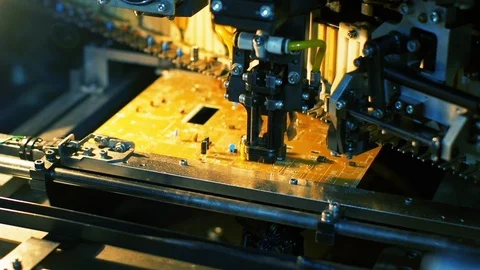 SMT Pick and Place Machine Placing Components on PCB Stock Footage 89003301