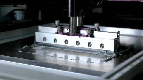 SMT solder paste printing process in modern electronics manufacturing facility Stock Footage 325433315