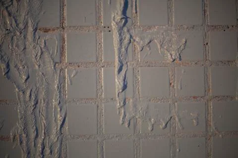 Smudges of paint on the wall. Stock Photos
