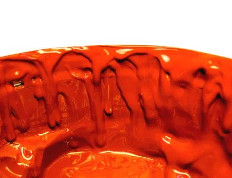 Smudges of a red paint in the container Foto stock