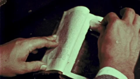 Smuggler Hiding Narcotics in Book Video stock 311043869