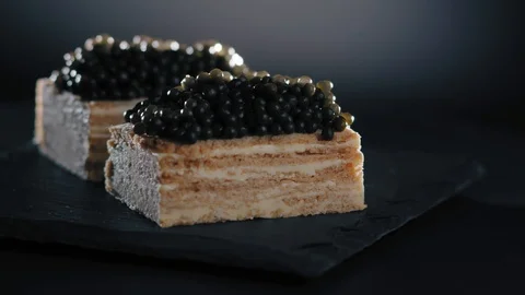 Snack Appetizer with Black Caviar Bread and Butter Video stock 107445444
