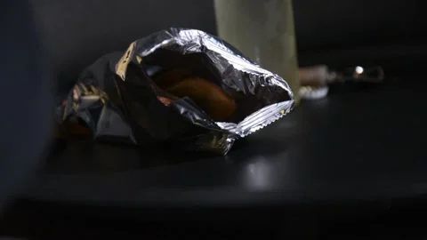 Snack bag filled with crunchy cracker Stock Footage 337000920