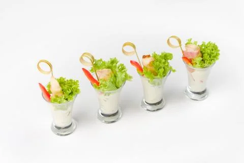 Snack canapes to buffet on a white background Foto stock