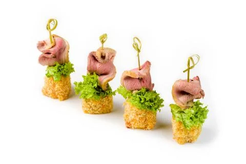 Snack canapes to buffet on a white background Foto stock