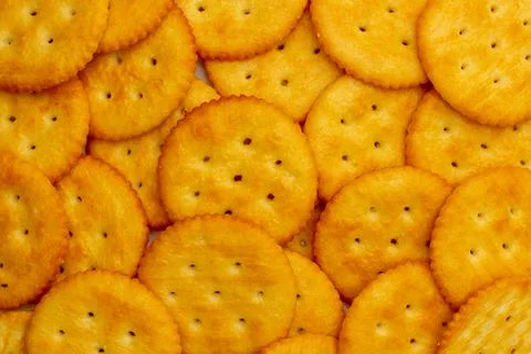 Snack concept, Stacking of salty crackers or crunchy biscuits as a background Foto stock