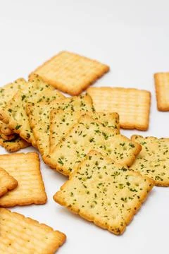 Snack concept, Vegetable crackers and biscuits are stack in heap isolated on  Stock Photos
