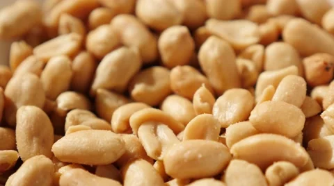 Snack food groundnut in a bowl slow tilting background 4K 2160p UltraHD video Stock Footage