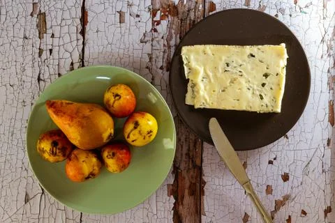 Snack with fresh wild pears and fresh cheese Stock Photos