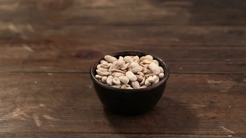 Snack peanuts in a plate Stock Footage 94740391