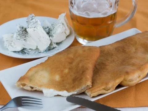 Snack pie with cheese and beer Stock Photos