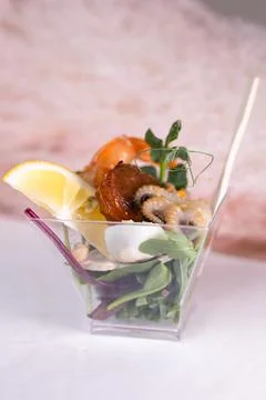 Snack in a plastic cup close-up. appetizer on the buffet table Stock Photos