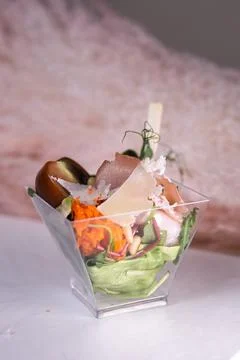 Snack in a plastic cup close-up. appetizer on the buffet table Stock Photos