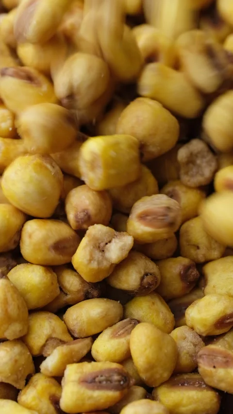 Snack spicy corn kernels, close up Stock Footage 282444123