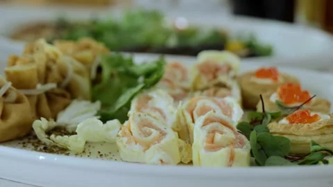 Snack table. Canape with vegetables and cheese, Served table with food. Lots of Stock Footage 253322703