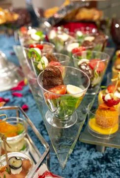 Snacks and salads on the buffet table. catering at the event. Stock Photos