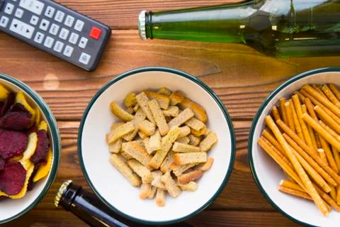 Snacks, beer and remote control Foto stock